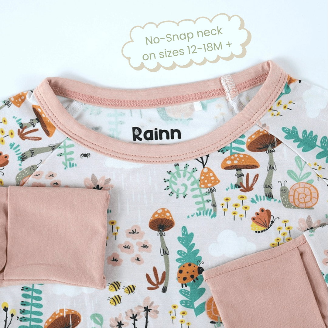 Close-up of Rainn's cozy sustainable jammies showcasing earthy tones and nature-inspired prints, perfect for gentle babywear.