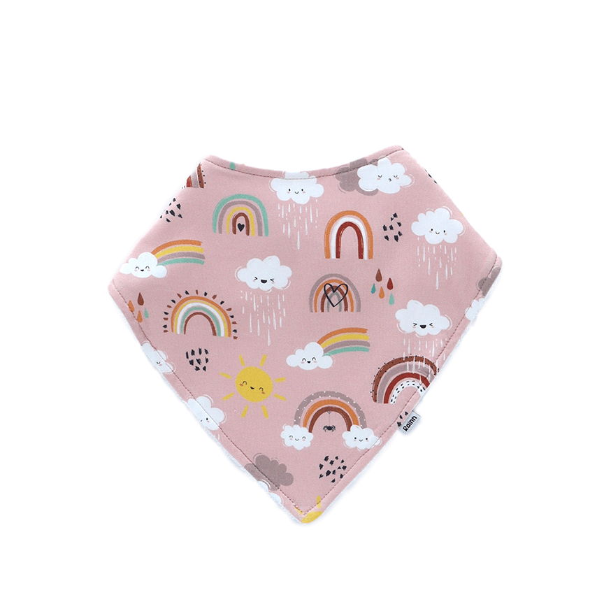 Cute Rainnbow bandana dribble bib in soft pink with rainbows and clouds, perfect for drooly babies. Eco-friendly and hypoallergenic.