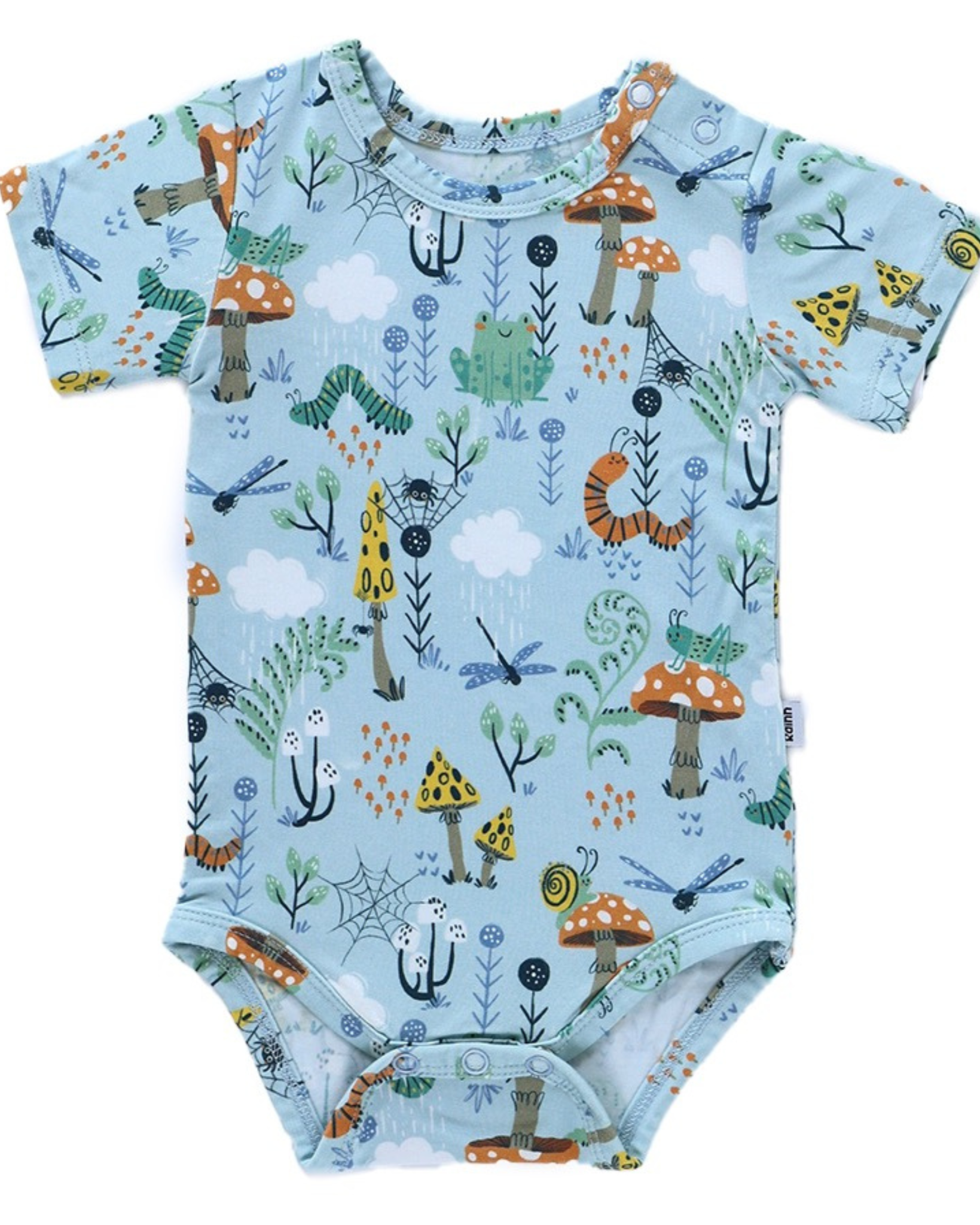 Bamboo Onsie with woodland creatures, featuring frogs, dragonflies, and mushrooms on a soft, blue background.